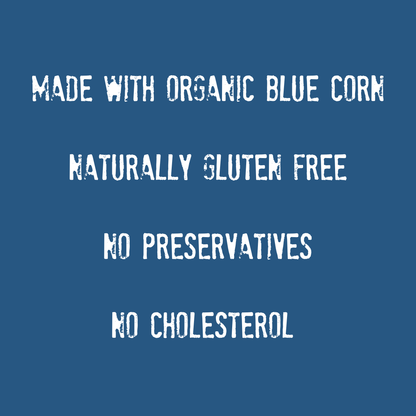 White text on blue background stating: Mi Niña Tortilla Organic Blue Corn “Sea Salt” Tortilla Chip—made with organic blue corn, seasoned with sea salt, naturally gluten free, no preservatives, and no cholesterol.