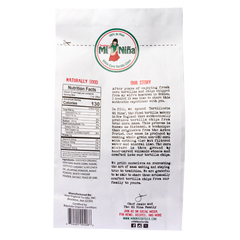 Back of a 12 oz Mi Niña Tortilla “Jalapeño Agave” Chip bag from the 9 Pack, showing nutrition, ingredients, brand story, and contact info. The design has a circular logo with a girl and text in English and Spanish.
