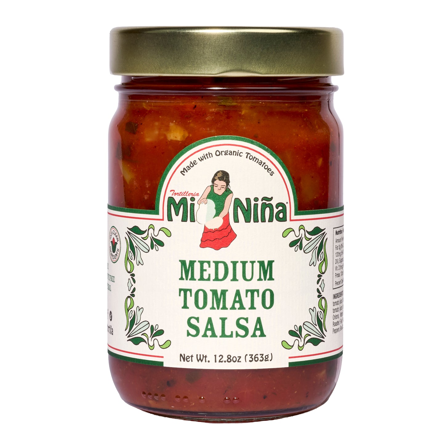 A 6 pack of Mi Niña Tortilla Medium Tomato Salsa (12.8 oz each) in glass jars with gold lids, featuring labels with a woman in traditional dress, green designs, and “Made with Organic Tomatoes.”.