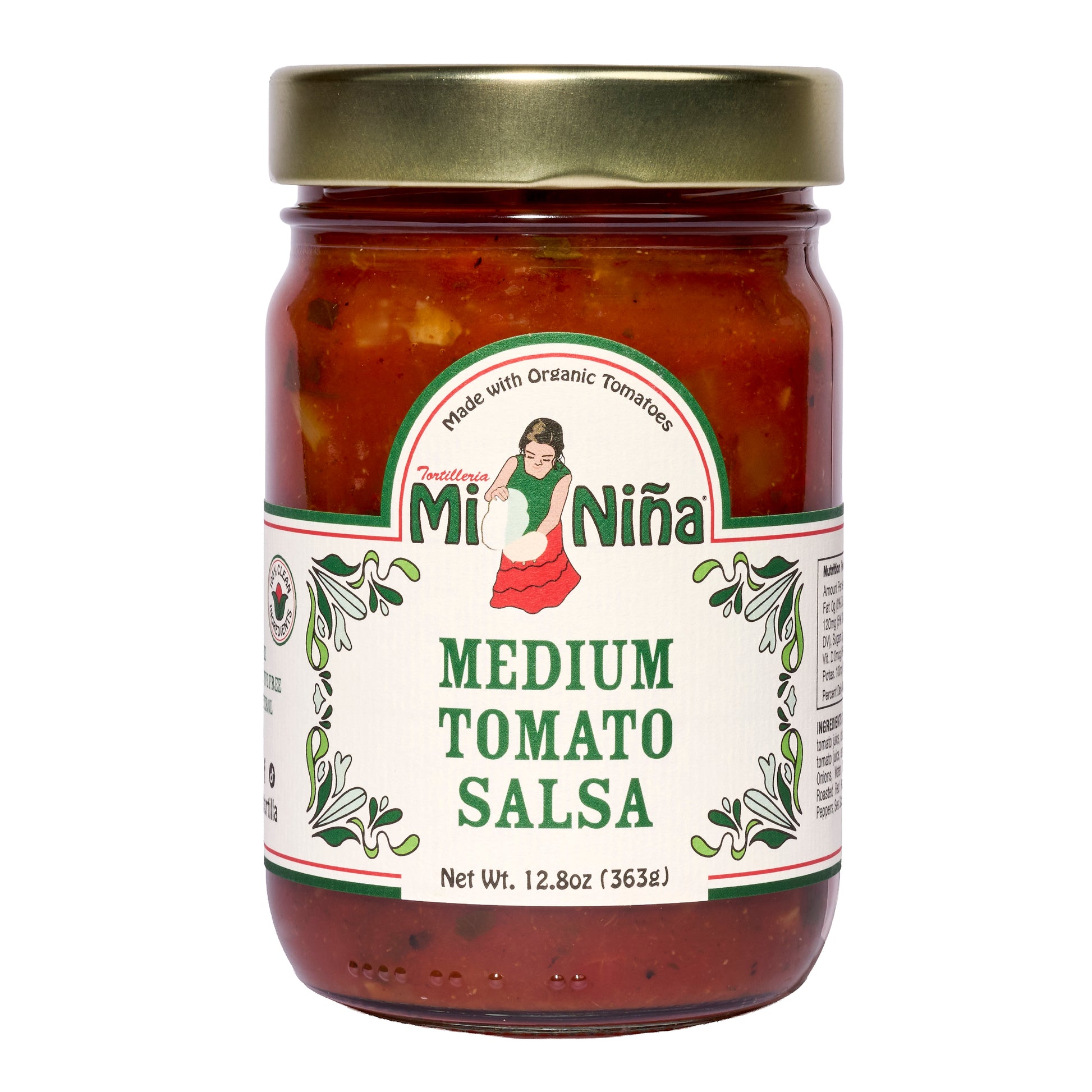 A 6 pack of Mi Niña Tortilla Medium Tomato Salsa (12.8 oz each) in glass jars with gold lids, featuring labels with a woman in traditional dress, green designs, and “Made with Organic Tomatoes.”.