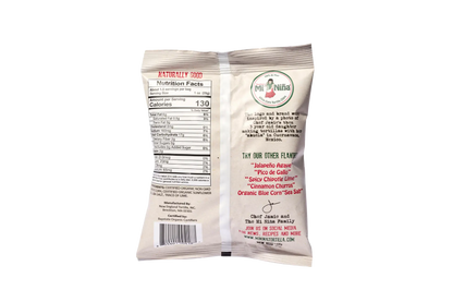 Back of a Mi Niña Tortilla Organic “Sea Salt” White Corn Tortilla Chip 24 Pack/1.5 oz bag with nutrition facts, product details, barcode, and other sea salt flavor varieties shown on a white background.