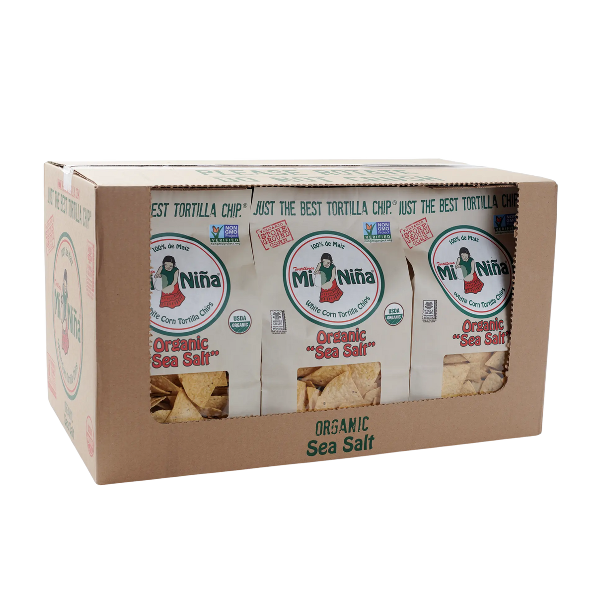 A cardboard box labeled Mi Niña Tortilla Organic Sea Salt White Corn Tortilla Chip - 9 Pack / 12 oz, with three chip bags partially visible through a front cutout.