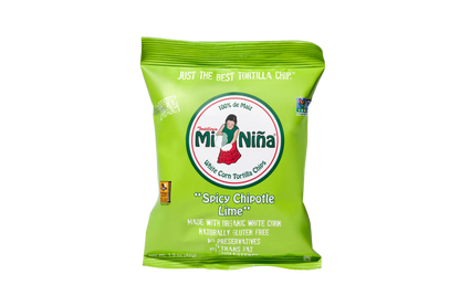 A 1.5 oz bag of Mi Niña Tortilla “Spicy Chipotle Lime” Tortilla Chips (24 Pack), made with organic white corn, is gluten-free, has no preservatives, and features “100% de Maíz” with illustrations of a woman and corn on the packaging.