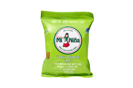 A 1.5 oz bag of Mi Niña Tortilla “Spicy Chipotle Lime” Tortilla Chips (24 Pack), made with organic white corn, is gluten-free, has no preservatives, and features “100% de Maíz” with illustrations of a woman and corn on the packaging.